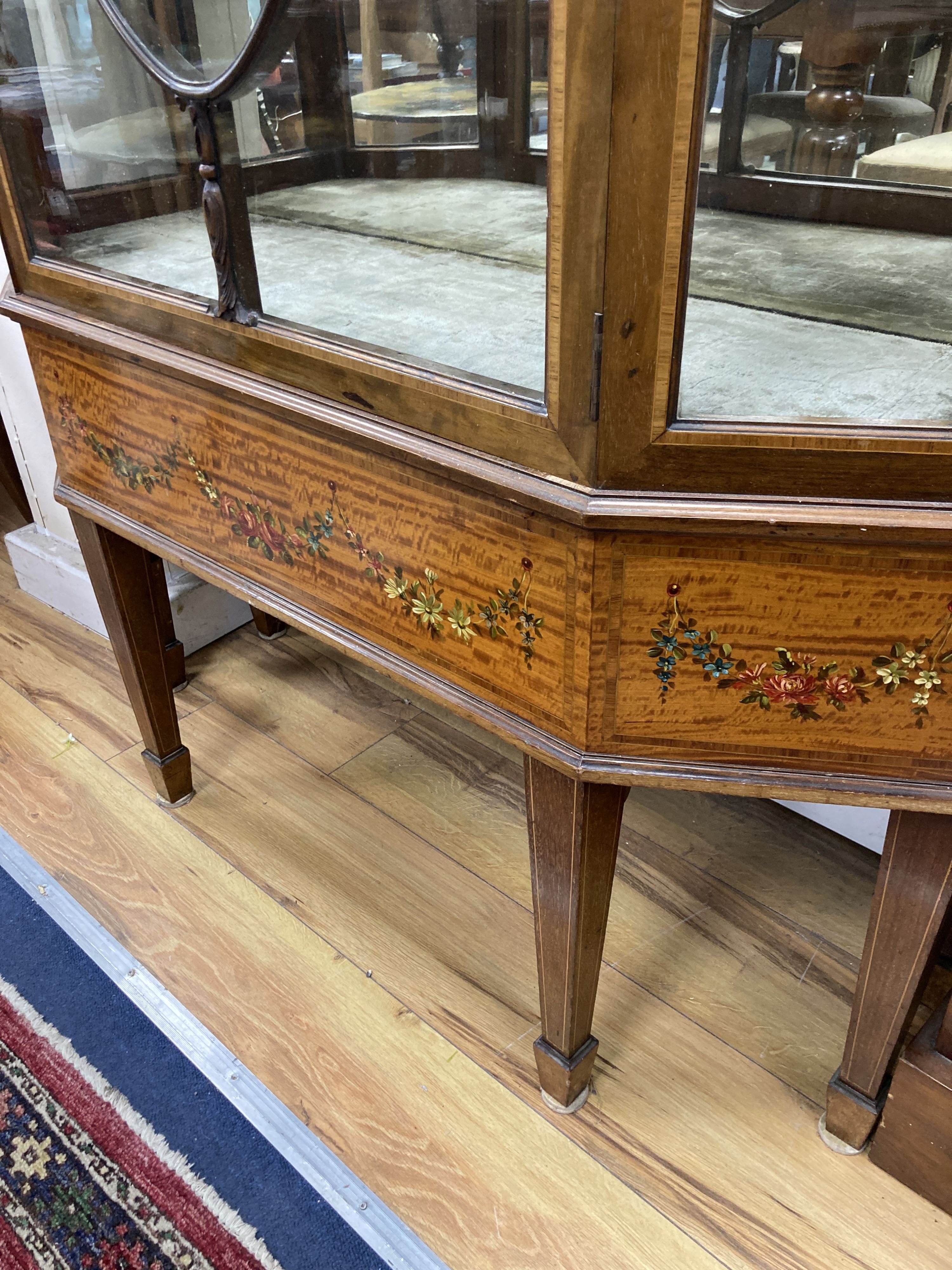 An Edwardian painted and banded mahogany and satinwood display cabinet. W-108, D-38, H-194cm.